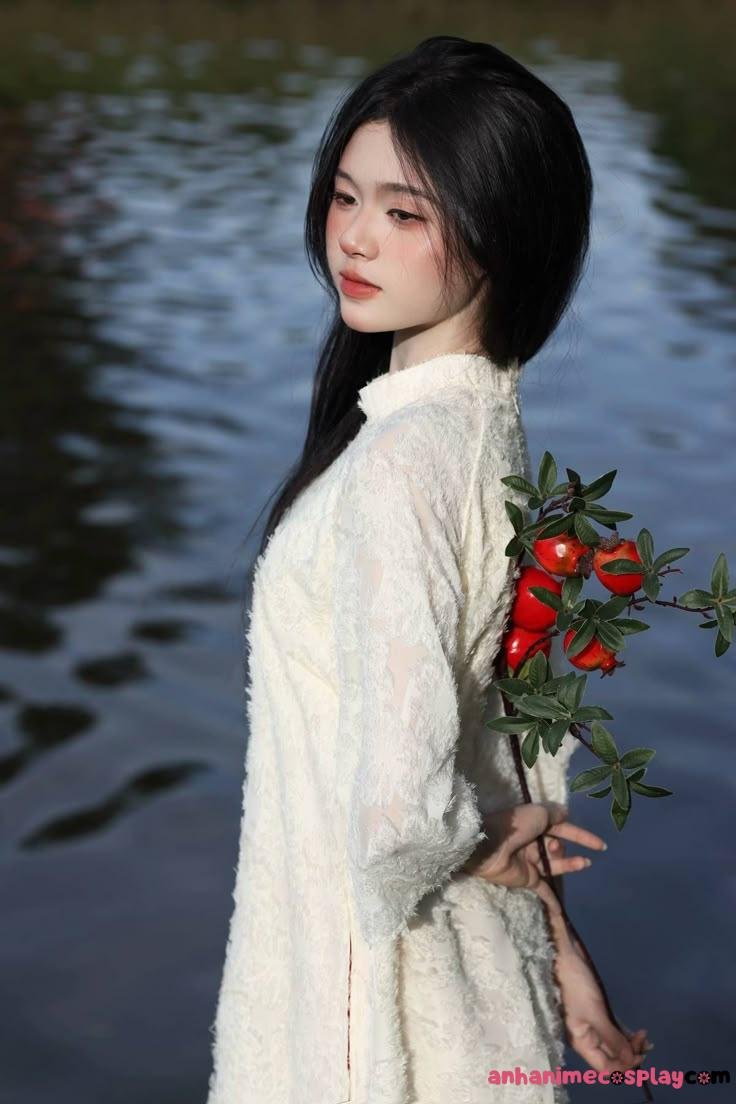 Gái xinh mặc áo dài xanh